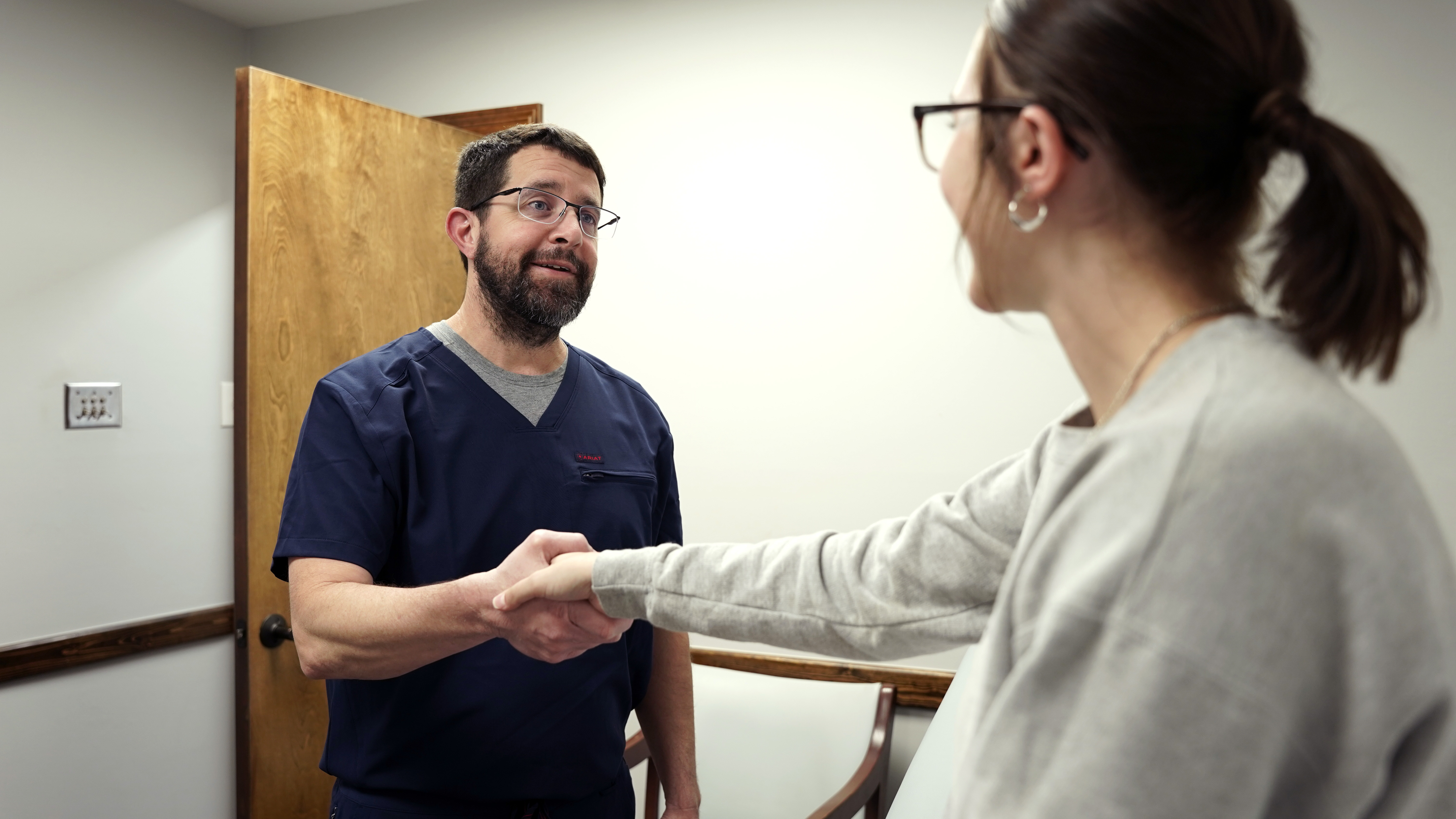 A Sulphur Surgical Clinic surgeon greeting a patient